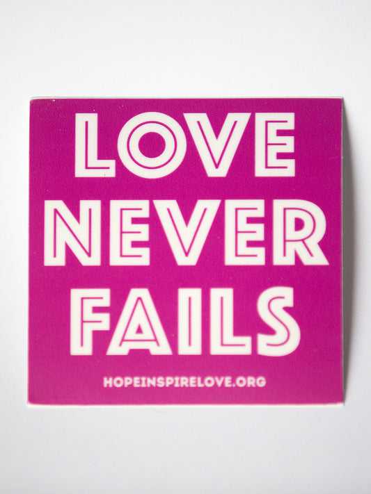 Love Never Fails Sticker - Magenta